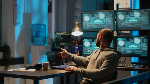 Business owner reviewing cybersecurity laws and data compliance requirements in 2026