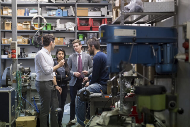 Startup owner reviewing an equipment leasing contract for business growth