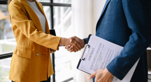 Business owner reviewing confidentiality clauses to protect sensitive company information