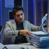 Business owner organizing business records for legal protection and dispute readiness