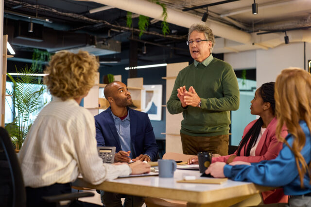 Founder reviewing investor term sheet clauses before signing startup funding documents