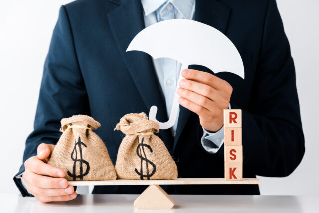 Business owner separating business debt from personal risk with records and contracts