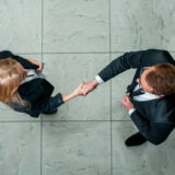Business partners planning a partner buyout agreement and ownership separation